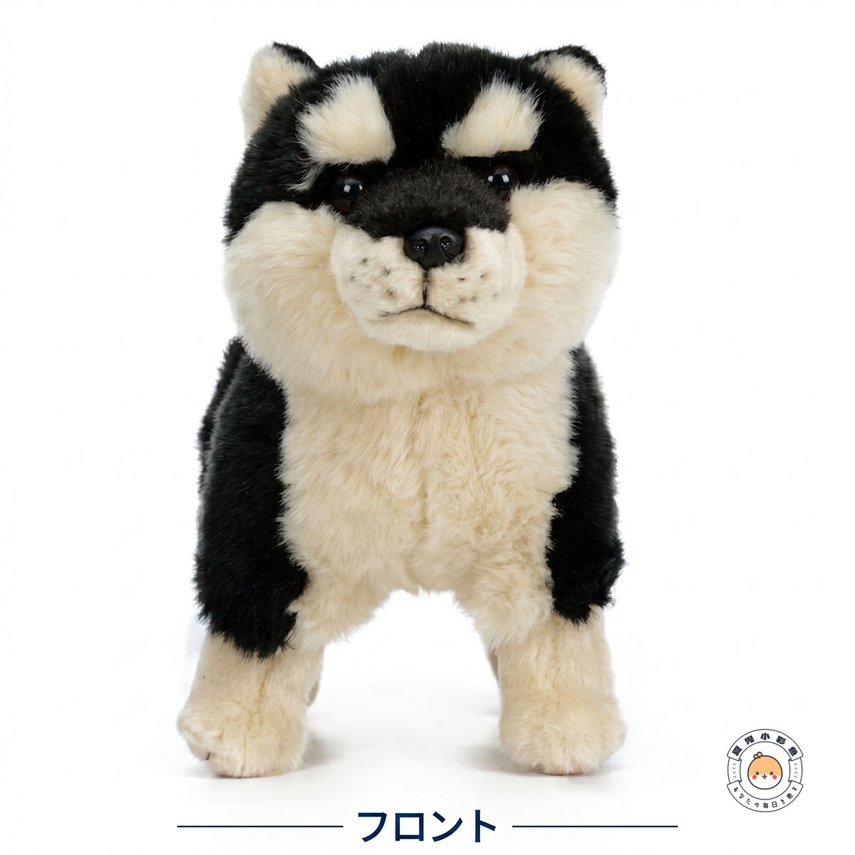 まっすぐこちらを見つめる黒柴ぬいぐるみのフロントビュー。黒と白の美しいコントラストとつぶらな瞳