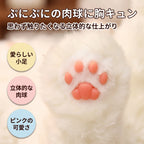 ペルシャ猫ぬいぐるみの足裏にある、ぷにぷにとした感触が伝わる立体的なピンク色のシリコン製肉球のクローズアップ