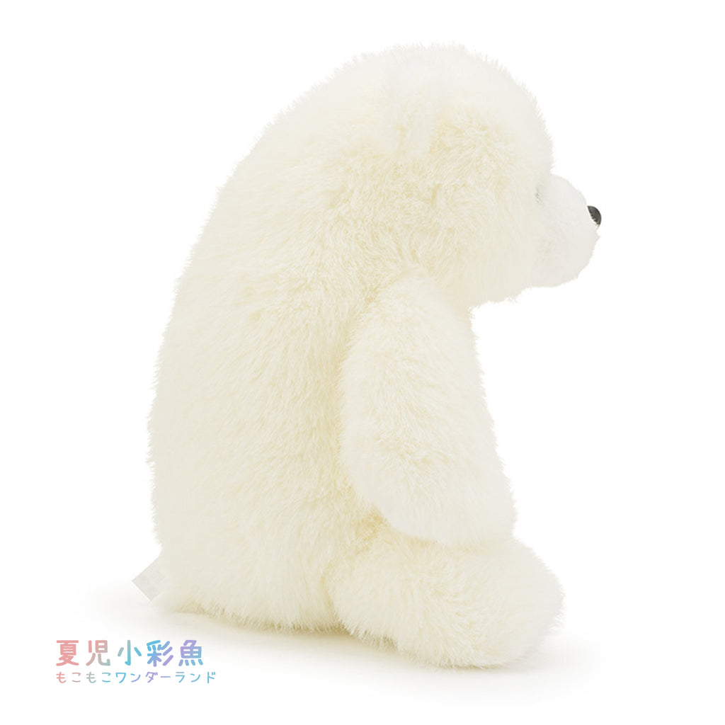 ゆるっとおすわりシロクマぬいぐるみの横姿、背中のなだらかなカーブとおすわりフォルム