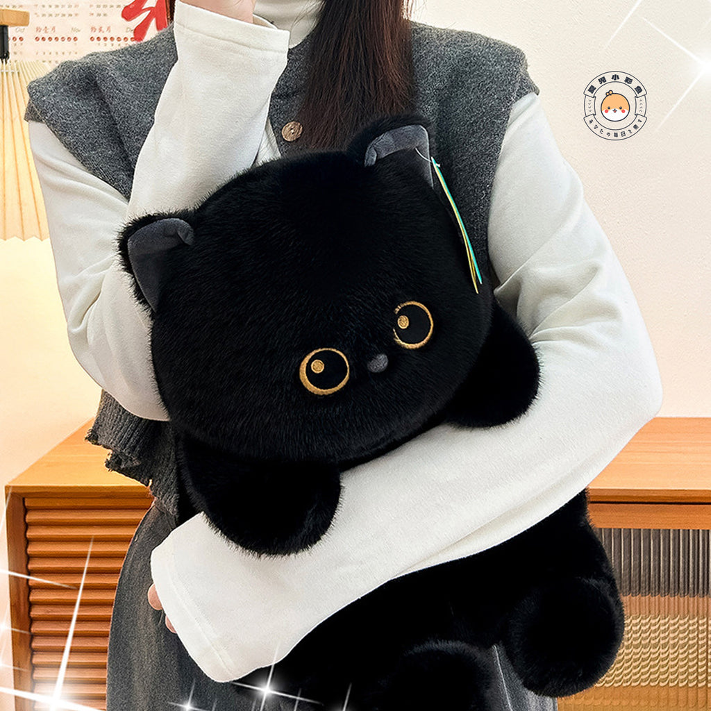 黒猫 ぬいぐるみ 座り姿 腕に抱きしめられるサイズ感とくりくりした大きな瞳